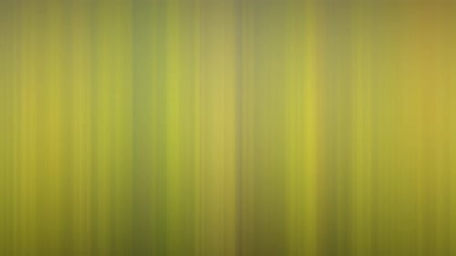 Telón de fondo en movimiento borroso abstracto con patrón lineal vertical que cambia de formas y colores