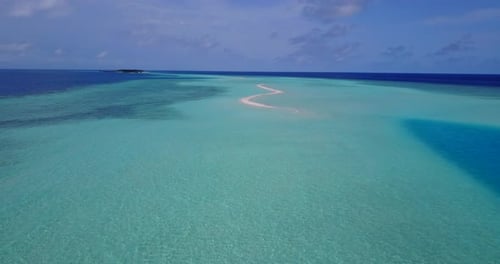 Daytime above abstract shot of a white sandy paradise beach and blue water background in colourful 4