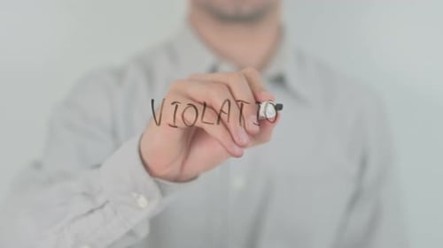 Violation Writing on Screen with Hand