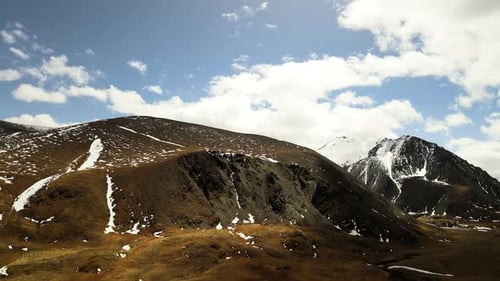 Mountain Peaks Covered with Snow