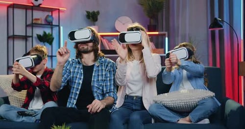 Family Enjoying Virtual Reality Experience at Home