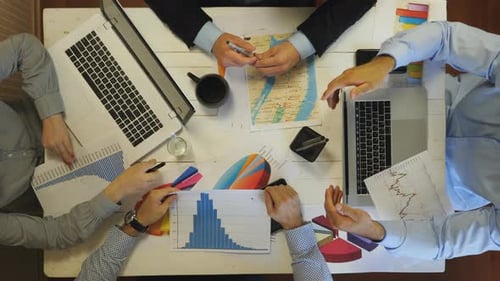 Company Boss Explaining a New Project Strategy to Employees at Corporate Meeting at Office