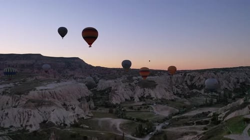 parade of balloons taking off at dawn in Cappadocia. travel concept