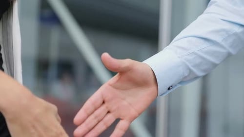 Business Handshake Close Up in Urban Setting