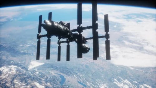 A View of the Earth and a Spaceship. ISS Is Orbiting the Earth