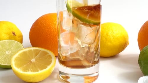 Refreshing Citrus Drink Preparation with Soda and Ice