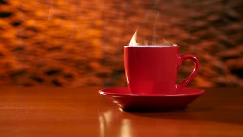 Hot Beverage in Red Cup Steaming Vapors