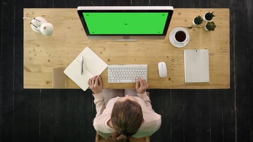 Casual woman working at her working place. Green Screen