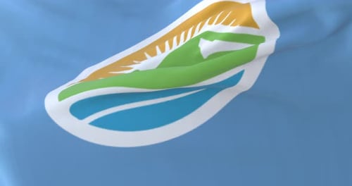 Waving Flag with Mountain and Sun Emblem Loop