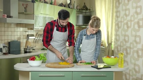 Woman and Man Cooking.