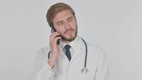 Doctor Talking on Phone in Hospital Setting