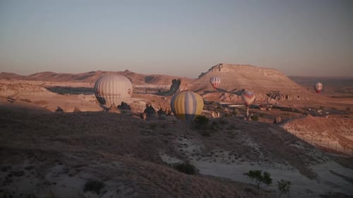 Cappadocia Landscape with Hot Air Balloons at Sunrise