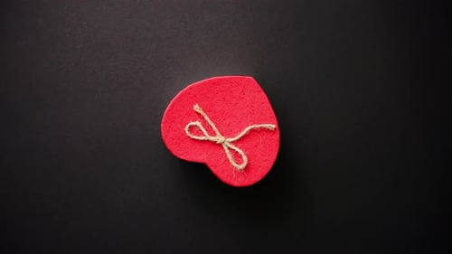 Beautiful Heart Shaped Gift Box on Black Surface