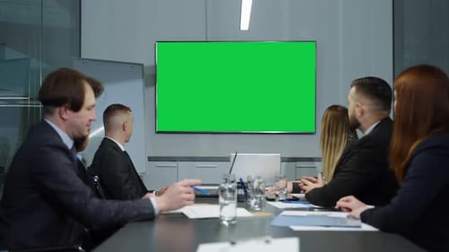 Green Screen in Office at Teleconference with Business Partners