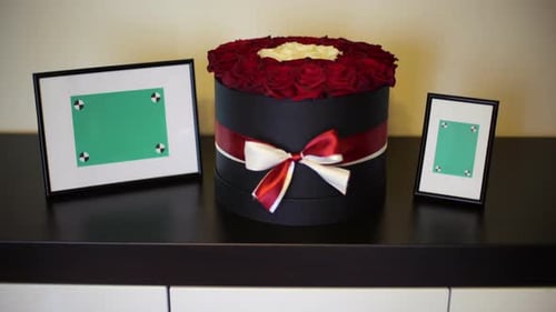 Floral Arrangement with Green Screen Picture Frames