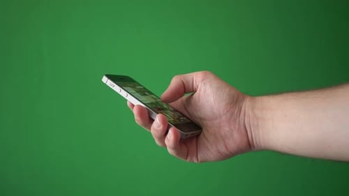 Man Using Phone Isolated On Chroma Key Green Screen Background