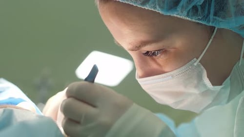 Medical Professional Performing Surgery Close Up