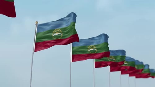 Realistic Flags Waving in the Wind Under a Clear Sky