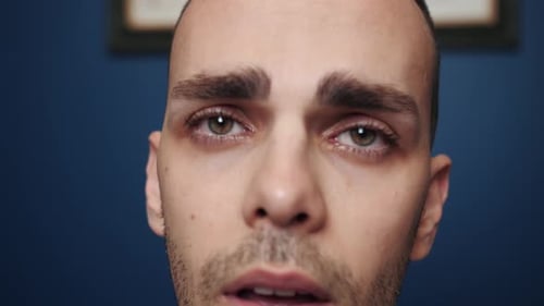 Close Up Portrait Man with a Problem Crying. Cry People Concept. Tears in Eyes of Crying Man. True