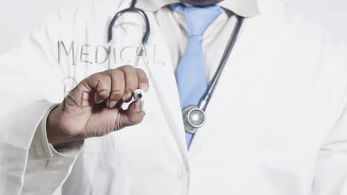 Doctor Writes Medical Research on Glass Surface