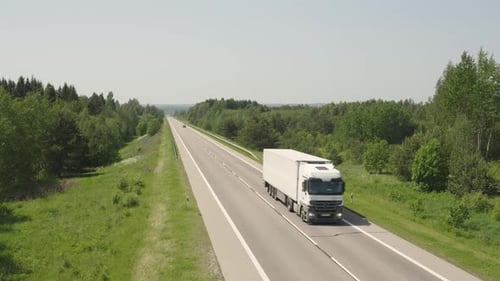 Truck On The Road. Truck riding on Left-hand traffic