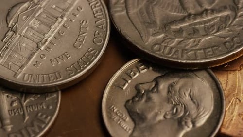 Rotating stock footage shot of American monetary coins - MONEY 0291