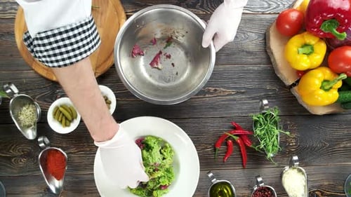 Chef Prepares a Fresh Steak Salad from Above