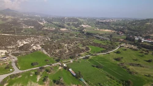 Types of Cyprus in the mountains. Top view of the mountains and human structures.