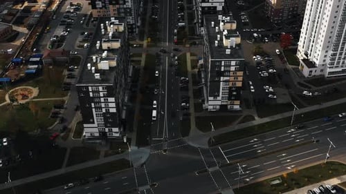 Top View, Drone Tilts Up on National Library in Minsk Flying Above Beautiful City Streets and