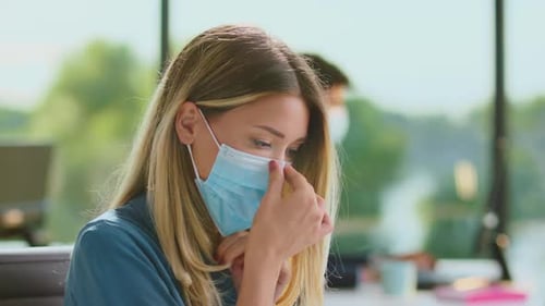 Women working in office in COVID-19 time