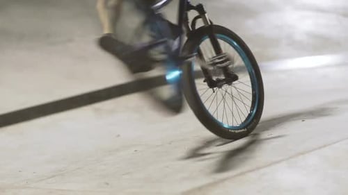 MTB Bicycle Rider Does Various Tricks While Riding in Skatepark