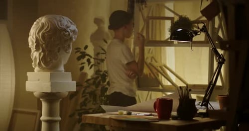 Young Artist Drawing at Table