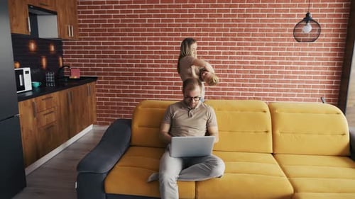 Family at Home Working on Computer