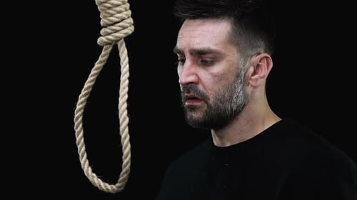 Scared Desperate Male Putting Hangmans Noose Around Neck, Suicide Attempt