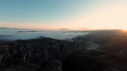 Aerial of Epic Cinematic Sunset Over Valley