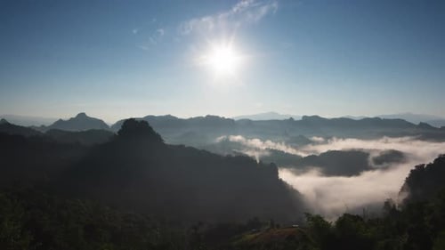 Mountains and Fog at Sunrise