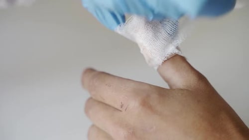 Bandaging a Finger Wound Close Up