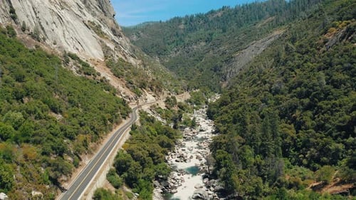 River & Road In The Valley