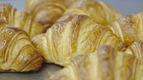 Close-up of Golden-Brown Croissants on a Table