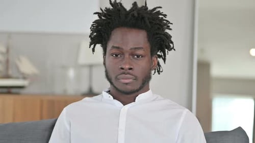 Portrait of Young Adult Male in Modern Home