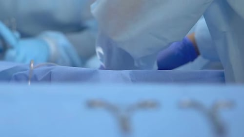 Surgical Scissors on Table, Medical Worker Operating Patient, Hospital Team