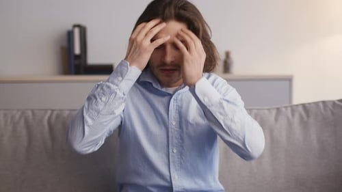 Man Talking on Camera in an Indoor Environment