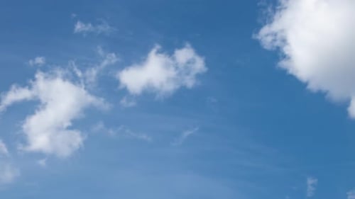 Fluffy White Clouds Moving Fast in Time-lapse. Daylight, Cloudy Heaven Background. Timelapse of