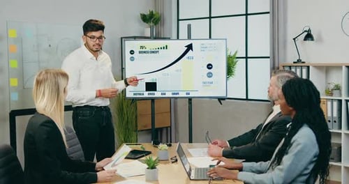 Office Manager Explaining Presentation About Business Concept for Successful Businesspeople