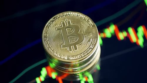 Stack of Gold Bitcoin Coins Close Up