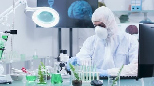 Medical Researcher Working in Clean Laboratory