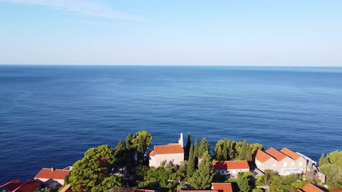Aerial View of Sea Horizon and Island with Old Architecture Buildings