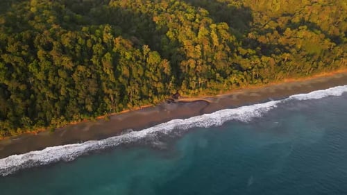 Slow approaching aerial view of the Osa Peninsula coast in Costa Rica