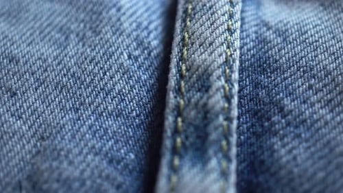 Denim Fabric Close Up Showing Seam