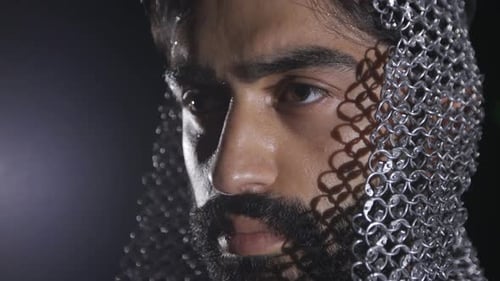 Man with Chainmail Armor Head Covering Close Up